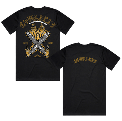 Black short-sleeve t-shirt shown from the back and front, featuring a large graphic on the back with crossed swords, flames, and the word 'Domasky' in arched gold lettering, plus a smaller matching 'Domasky' print on the front chest.