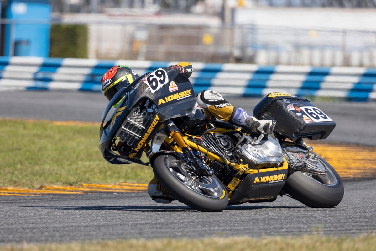 Nowaskey race bagger leaned over in a corner on track