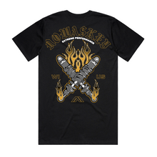 A black short sleeve T Shirt with Nowaskey in Yellow. With a graphic of shocks crossed in an X and and Flames coming from behind the Shocks. 