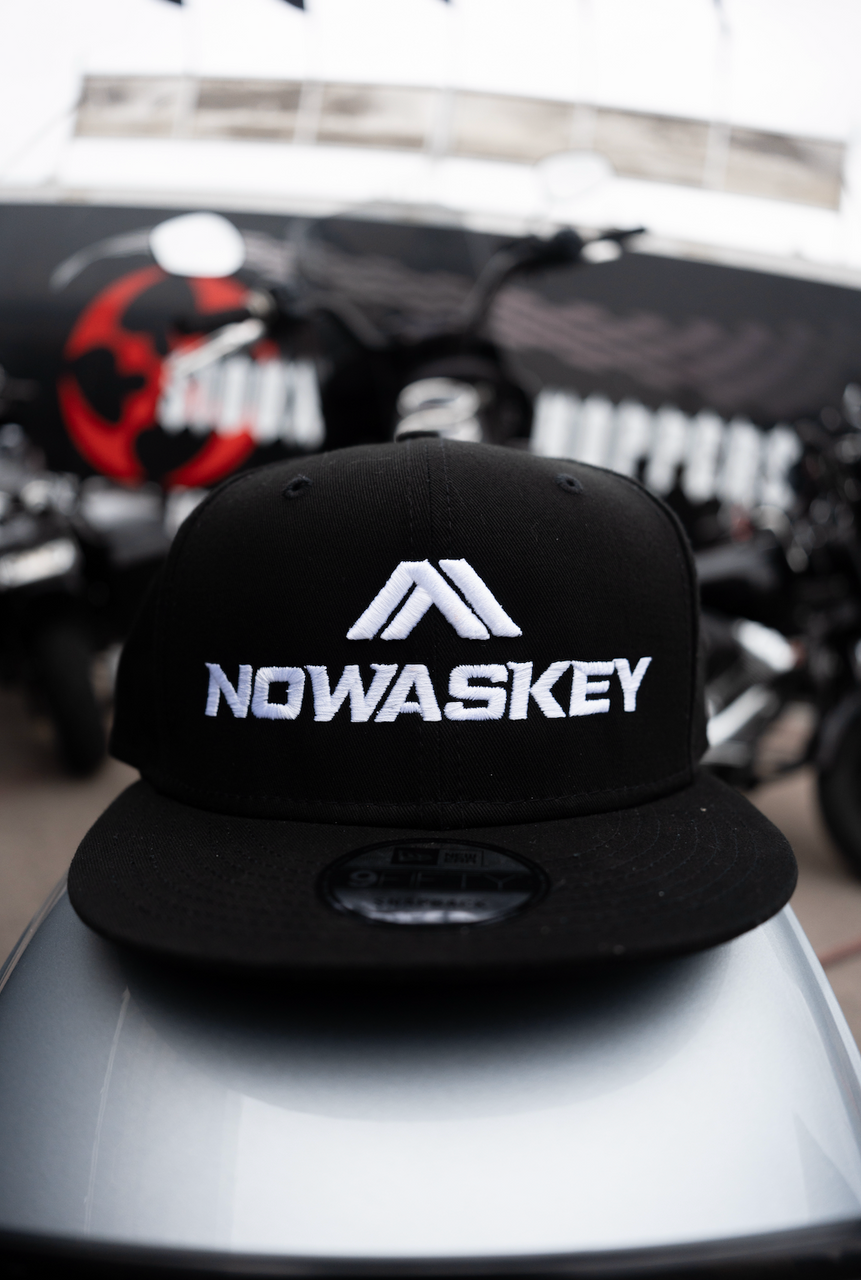 Elevate your look with the stylish black flat brim Nowaskey hatfeaturing striking Nowaskey white embroidery.